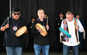 Indigenous musicians play for Pope Francis during a welcoming ceremony for the Pope at Edmonton International Airport in Alberta, western Canada, on July 24, 2022. - Pope Francis visits Canada for a chance to personally apologize to Indigenous survivors of abuse committed over a span of decades at residential schools run by the Catholic Church.