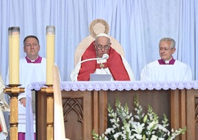 Pope Francis participates in an open-air Mass at Commonwealth Stadium in Edmonton, Canada, on July 26, 2022. - The Pope will be celebrating the feast of St. Anne, grandmother of Jesus, a day of particular reverence for Indigenous Catholics.