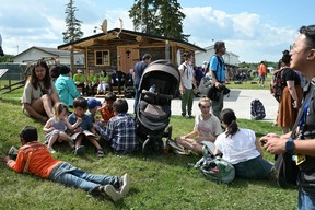 People await the arrival of Pope Francis at Lac Ste. Anne, northwest of Edmonton, Alberta, Canada, on July 26, 2022.