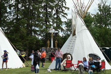 People await the arrival of Pope Francis at Lac Ste. Anne, northwest of Edmonton, Alberta, Canada, on July 26, 2022.