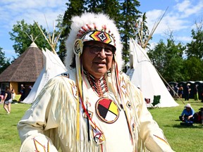A member of the Alexis Nakota Sioux Nation awaits the arrival of Pope Francis at Lac Ste. Anne, northwest of Edmonton, Alberta, Canada, on July 26, 2022.