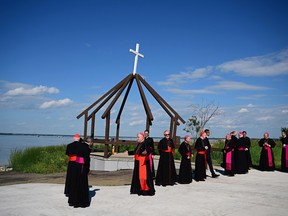 Clergy members await the arrival of Pope Francis at Lac Ste. Anne, northwest of Edmonton, Alberta, Canada, on July 26, 2022.