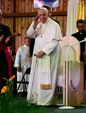 Pope Francis waves as he arrives to give the Liturgy of the Word at the Shrine during Lac Ste. Anne Pilgrimage at Lac Ste. Anne, northwest of Edmonton, Alberta, Canada, July 26, 2022.