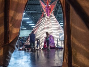 One of three Tipis set up features Tipi teaching with Elder Howard Mustus.The Indigenous Experience at K-Days in Hall C at the Edmonton Expo Centre on July 26, 2022. Shaughn Butts - Postmedia