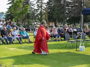 The parish of St. Jean Baptiste in Morinville held a mass on the one-year anniversary of the fire that destroyed the church.