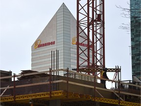 EDMONTON, ALTA: DECEMBER 9, 2014 -- The Kelly Ramsey Tower construction with a backdrop of the Enbridge building. It was announced at a news conference Enbridge's long-term city office plans, confirming tenancy agreements in the new Kelly Ramsey Tower still under construction in Edmonton, December 9, 2014.