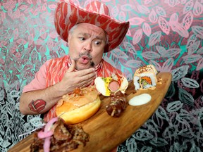 Dressed entirely in bacon print western attire, BaconFest Sheriff, "Smokey T Bacon", also known as comedian Donovan Workun, with bacon-themed offerings available during BaconFest at this year's K-Days.