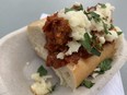 The meatball sandwich (four tickets) by Black Sheep Eatery on food truck row, reviewed July 21 at the 2022 Taste of Edmonton festival, has a lot going for it, but a toast on the bun would go a long way.