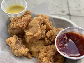 The Korean fried chicken from BF Korean Fried Chicken and More begs the question, what more could you need? Other than the garlic chill and mustard dipping sauces, of course, reviewed July 21 at the 2022 Taste of Edmonton Festival.