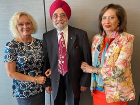 Welcoming former citizenship judge Gurcharan Bhatia to NorQuest College were Wendy Kinsella, left, and Alberta's Lt.-Gov. Salma Lakhani.