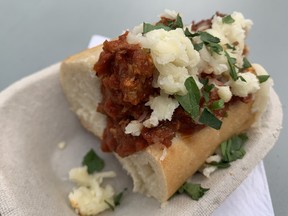 The meatball sandwich (four tickets) by Black Sheep Eatery on food truck row, reviewed July 21 at the 2022 Taste of Edmonton festival, has a lot going for it, but a toast on the bun would go a long way.