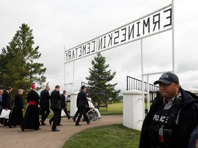 Pope Francis arrives to attend a silent prayer at the cemetery during his meeting with First Nations, Metis and Inuit indigenous communities in Maskwacis, Alberta, Canada July 25, 2022.