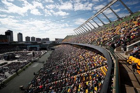 People attend a mass presided by Pope Francis at Commonwealth Stadium in Edmonton, Alberta, Canada July 26, 2022.