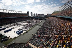People attend a mass presided by Pope Francis at Commonwealth Stadium in Edmonton, Alberta, Canada July 26, 2022.