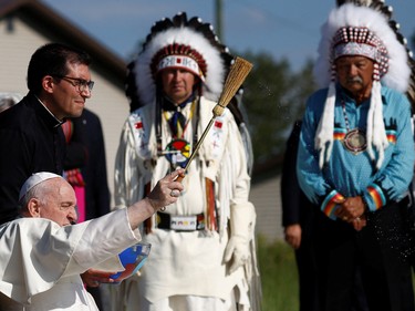 Pope Francis blesses the people as he attends the Lac Ste. Anne Pilgrimage, an annual pilgrimage that welcomes tens of thousands of Indigenous participants from throughout Canada and the United States each year, at Lac Ste. Anne, Alberta, Canada July 26, 2022.