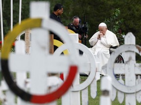 Pope Francis attends a silent prayer at the cemetery during his meeting with First Nations, Metis and Inuit indigenous communities in Maskwacis, Alberta, Canada July 25, 2022.