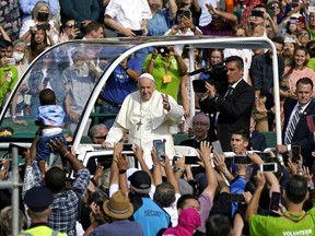 Pope Francis, the head of the Roman Catholic Church, arrives at Commonwealth Stadium in Edmonton, Canada to deliver an outdoor mass on Tuesday July 26, 2022. The pontiff was on a penitential pilgrimage to Canada to apologize for the role that the Catholic Church had in residential schools in Canada.