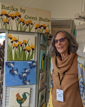 Gwen Bodie of Batiks by Gwen Bodie, one of the artisan marketplace vendors at the 2022 Edmonton Folk Music Festival.