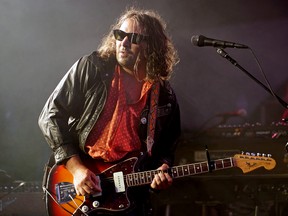 Adam Granduciel, vocalist and guitarist of The War On Drugs, performs onstage at the 2022 Edmonton Folk Music Festival on Friday August 4, 2022.