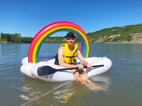 Edmonton Pride Float co-director Michael Magnussen on the North Saskatchewan River.