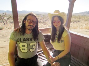Edmonton native Michael Rault, left, with partner and fellow musician Pearl Charles outside their home in Landers, California.
