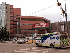 An Alberta Health Services EMS ambulance is seen near the University of Alberta Hospital.