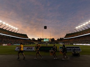The sun sets as the Edmonton Elks play the Saskatchewan Roughriders at Commonwealth Stadium in Edmonton on June 18, 2022.