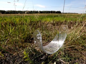 (scene of accident was across the street from 23150 Hwy 628)

A visor from a motorcycle helmet is visible at the scene of a fatal accident along Highway 628 near Range Road 231, Monday Aug. 15, 2022. On Sunday Aug. 14, 2022 Strathcona County RCMP along with fire and emergency medical services attended a serious collision on Highway 628 between Range Road 231 and 232 involving a motorcycle, pickup truck and car. The two occupants on the motorcycle were pronounced deceased on scene. Photo By David Bloom