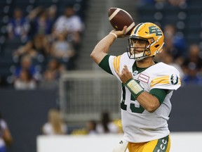 Edmonton Elks quarterback Taylor Cornelius (15) throws against the Winnipeg Blue Bombers in this file photo from Winnipeg on May 27, 2022.