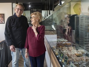 Bessie Diggins with Arlyn Sturwold, left, at Destination Doughnuts in Edmonton on Saturday, Aug. 13, 2022. The friends kept up their daily visits despite the pandemic.