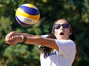 Madison Yellowknee from Wabasca, Alberta participates in a game of beach volleyball at Rundle Park in Edmonton on Monday August 15, 2022 during the 2022 Alberta Indigenous Games, North America's largest annual Indigenous summer games.