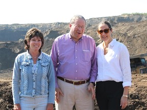 Minister Sonya Savage, Ambassador Kirsten Hillman, and Ambassador David L. Cohen posing for a photo on site at CNRL Horizon Oil Sands mine (Location: CNRL Horizon Oil Sands – North of Fort Mackay).