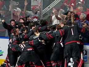 Team Canada celebrates after defeating Team Finland 3-2 in overtime during gold medal final game action at the International Ice Hockey Federation 2022 World Junior Championship in Edmonton, Canada on Saturday August 20, 2022.