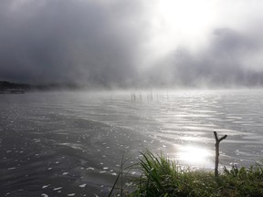 Fog hangs over the lake on Monday, Aug. 13, 2018 at Wabamun Lake.