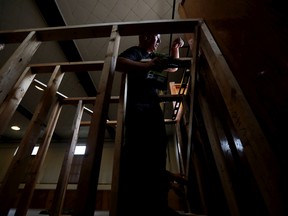 Adrian Jabrisch works to create an accessible entrance for the Edmonton Fringe Festival Volunteer Headquarters, Wednesday, August 3, 2022. The 41st Fringe Festival runs August 11-21.