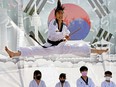 Ivana Au Yang executes a split kick during a taekwondo demonstration at the Korea pavillion during the Edmonton Heritage Festival in Hawrelak Park on Monday, August 1, 2022. The festival is looking for a new site next year due to a three-year closure of Hawrelak Park for rehabilitation work.