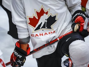 A Hockey Canada logo is shown on the jersey of a player with Canada's National Junior Team during a training camp practice in Calgary, Tuesday, Aug. 2, 2022.