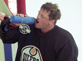 Wednesday October 10, 2007 Page C2

Brian Ross -- the Oilers' video coach, practice goalie and last resort in a netminding emergency -- came close to suiting up for an actual NHL game on one occasion.

TUESDAY, APRIL 8, 2003 PAGE B2 DD

Brian Ross slakes his thirst after a workout