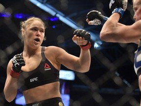 Ronda Rousey lines up compatriot Holly Holm during the UFC title fight in Melbourne on November 15, 2015.
