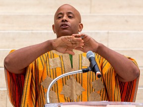 Malcolm Azania speaks during a ceremony where the City of Edmonton recommitted its support for the UN International Declaration of People of African Descent and announced new actions towards addressing anti-Black racism in Edmonton on Monday, Aug. 29, 2022.