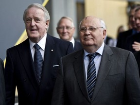 Former Soviet president Mikhail Gorbachev arrives to deliver a luncheon speech accompanied by former prime minister Brian Mulroney Friday, October 21, 2011 in Montreal. Gorbachev, the last leader of the Soviet Union, died Tuesday. He was 91.THE CANADIAN PRESS/Paul Chiasson