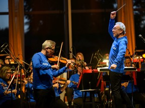 The Edmonton Symphony Orchestra, conducted by Robert Bernhardt, performs the first of four nights in Hawrelak Park's Heritage Amphitheatre for the annual Symphony Under the Sky concert series.