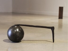 CORPUS XIII, steel and cast iron, at Catherine Burgess' show at Peter Robertson Gallery.