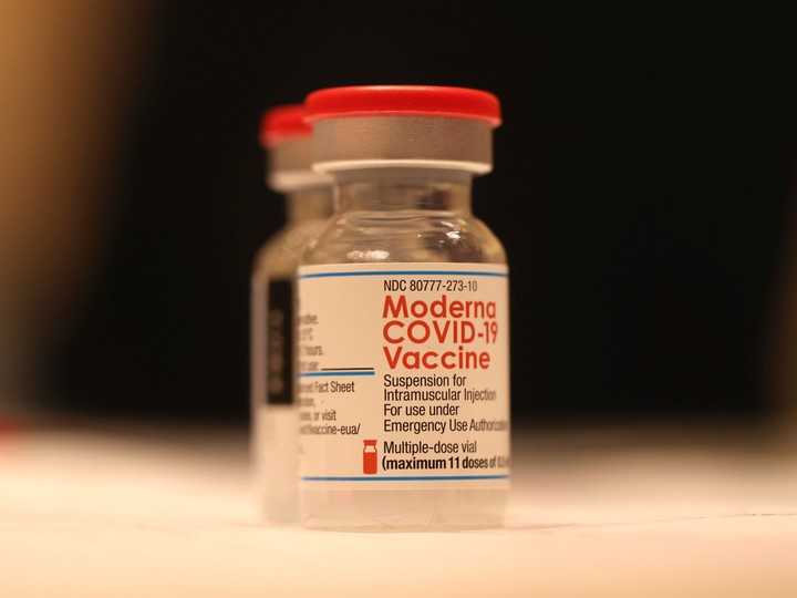  Vials of Moderna COVID-19 vaccine sit on a table at a COVID-19 vaccination clinic on April 06, 2022, in San Rafael, California.
