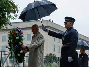 ARLINGTON, VIRGINIA - SEPTEMBER 11: U.S. President Joe Biden participates in a wreath-laying ceremony commemorating the 21st anniversary of the crash of American Airlines Flight 77 into the Pentagon during the September 11th terrorist attacks at the 9/11 Pentagon Memorial on September 11, 2022 in Arlington, Virginia. The nation is marking the twenty-first anniversary of the terror attacks of September 11, 2001, when the terrorist group al-Qaeda flew hijacked airplanes into the World Trade Center, Shanksville, PA and the Pentagon, killing nearly 3,000 people.