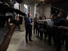 Conservative MP Michael Barrett speaks with reporters before attending caucus, in Ottawa, Wednesday, September 21, 2022.