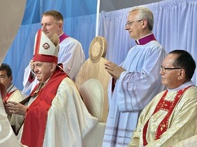 Pope Francis (left seated) and Rennie Nahanee (right seated) pictured at the holy mass held at Commonwealth Stadium in Edmonton on July 26, 2022.