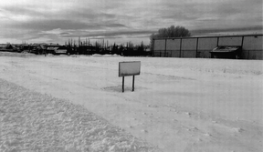 A runway sign is completely obscured by snow at Okotoks Air Ranch Airport in February of 2020.