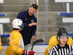 Former Edmonton Oilers defenceman Ladislav Smid gives instruction on the bench at Edmonton Oil Kings training camp at the Downtown Community Arena in Edmonton on Saturday, Sept. 3, 2022.