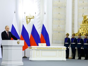 Russian President Vladimir Putin attends a ceremony to declare the annexation of the Russian-controlled territories of four Ukraine's Donetsk, Luhansk, Kherson and Zaporizhzhia regions on Sept. 30, 2022.